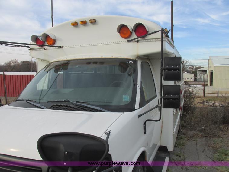 image for item J2353 2004 GMC Savana Thomas Built bus