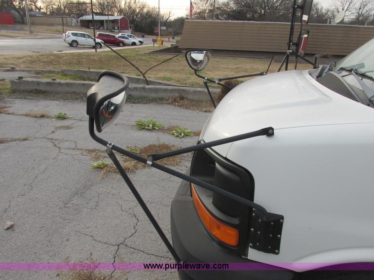 image for item J2353 2004 GMC Savana Thomas Built bus