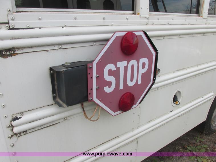 image for item J2353 2004 GMC Savana Thomas Built bus