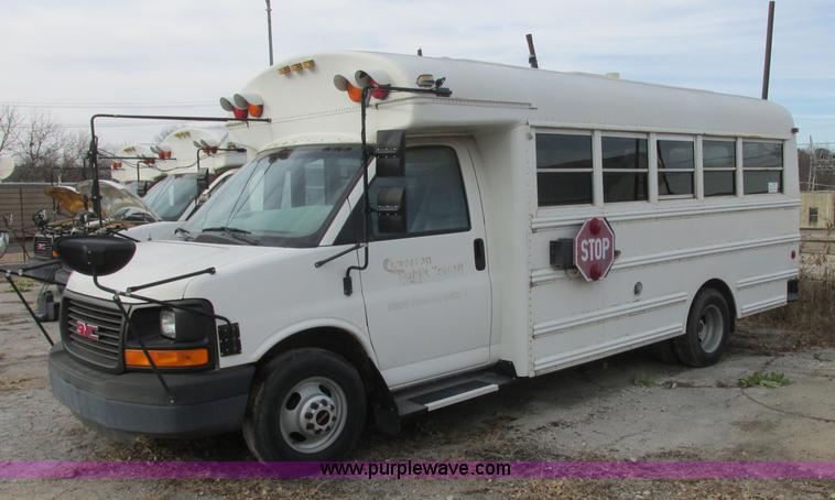 image for item J2354 2004 GMC Savana Thomas Built bus