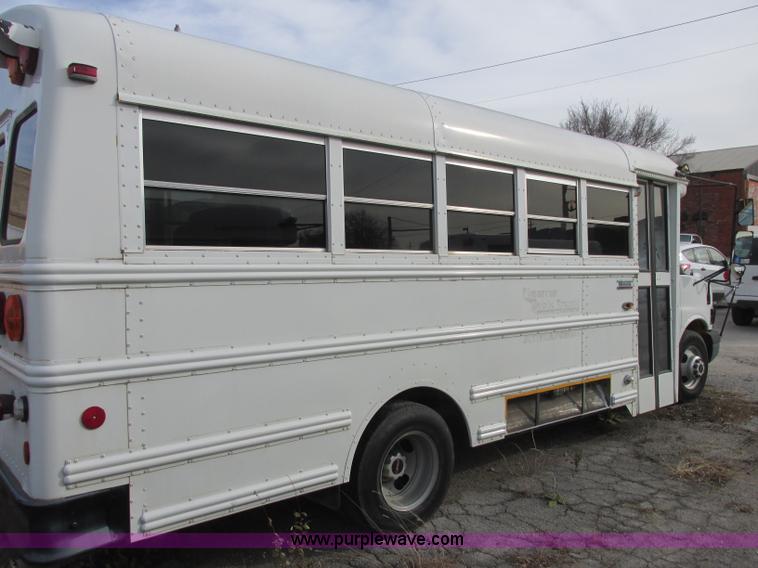 image for item J2354 2004 GMC Savana Thomas Built bus