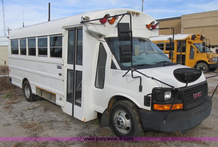 image for item J2354 2004 GMC Savana Thomas Built bus