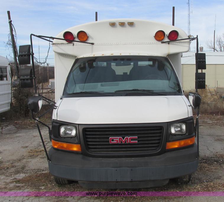 image for item J2354 2004 GMC Savana Thomas Built bus
