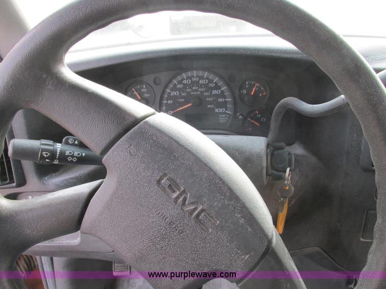 image for item J2354 2004 GMC Savana Thomas Built bus