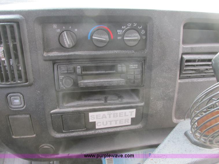 image for item J2354 2004 GMC Savana Thomas Built bus