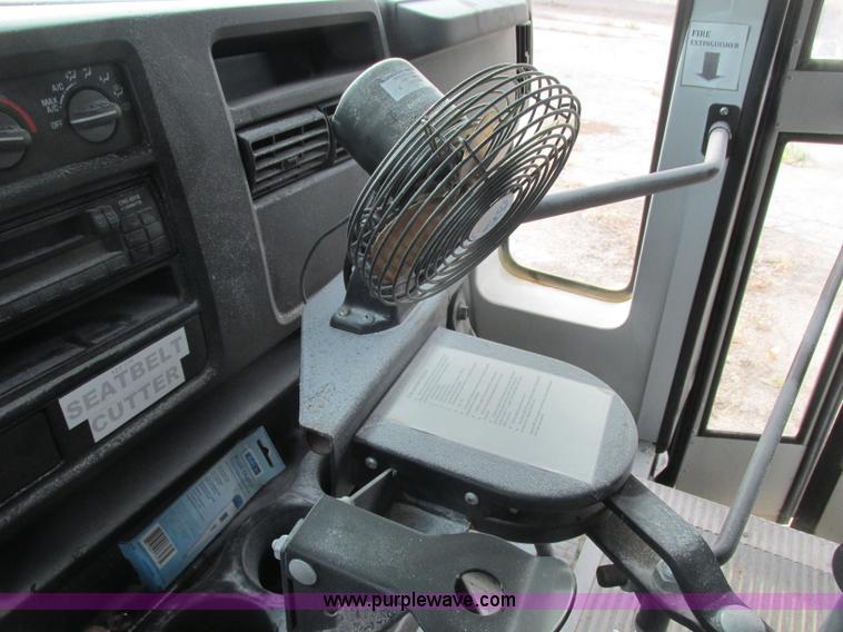 image for item J2354 2004 GMC Savana Thomas Built bus