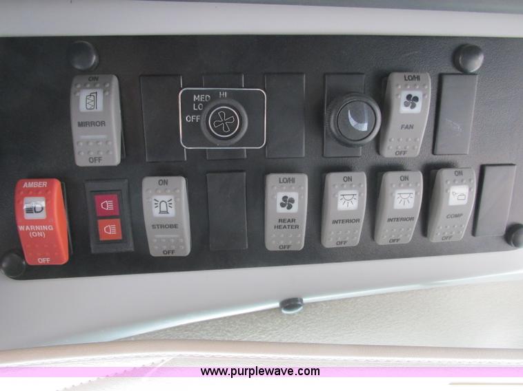 image for item J2354 2004 GMC Savana Thomas Built bus