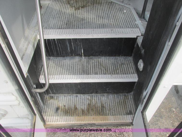 image for item J2354 2004 GMC Savana Thomas Built bus