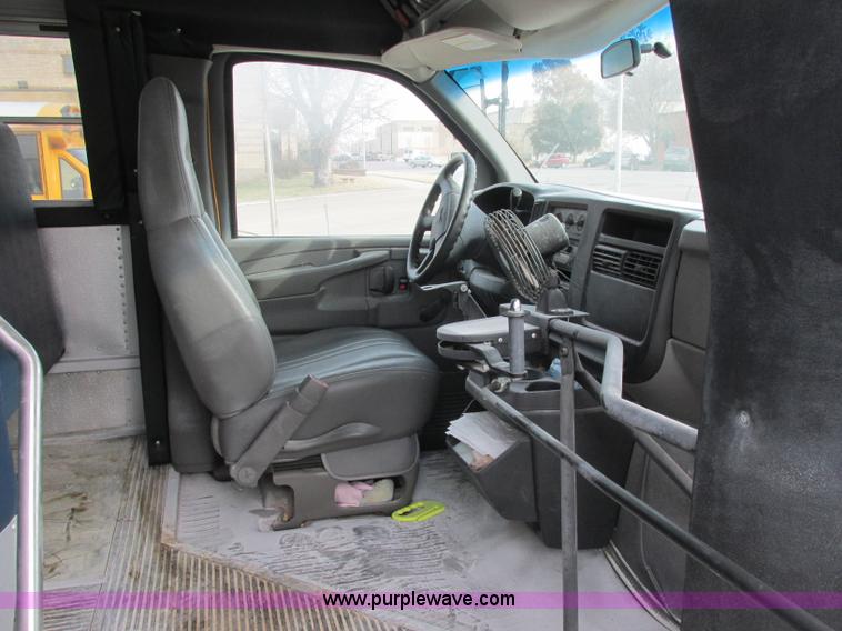 image for item J2354 2004 GMC Savana Thomas Built bus