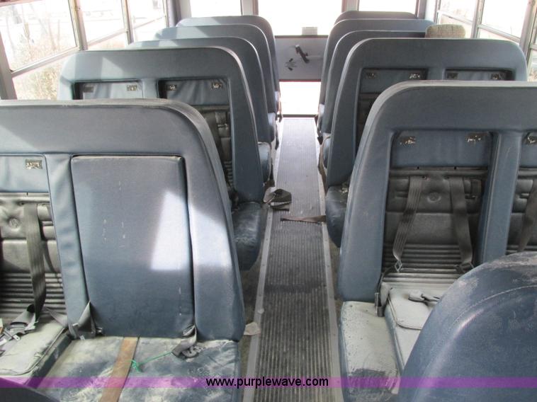 image for item J2354 2004 GMC Savana Thomas Built bus