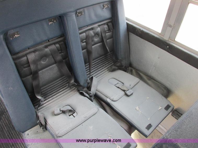 image for item J2354 2004 GMC Savana Thomas Built bus