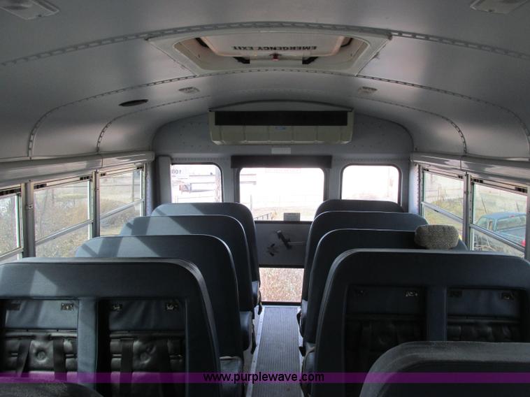 image for item J2354 2004 GMC Savana Thomas Built bus