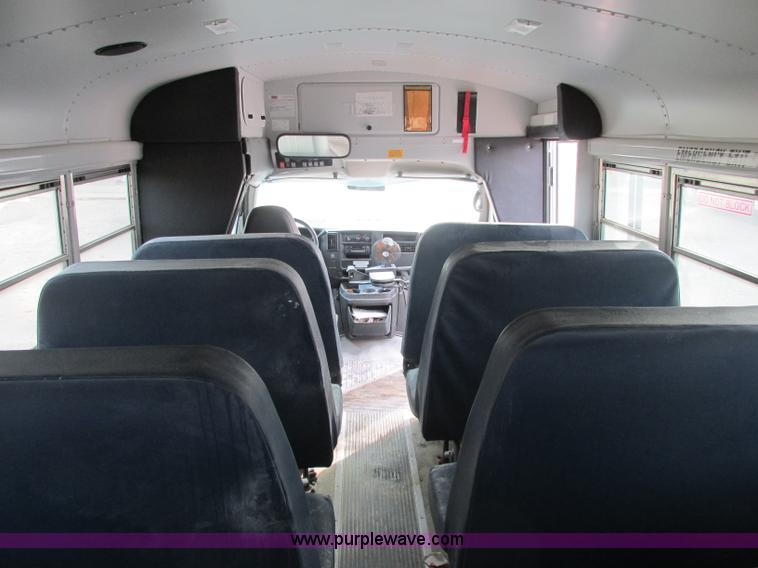 image for item J2354 2004 GMC Savana Thomas Built bus