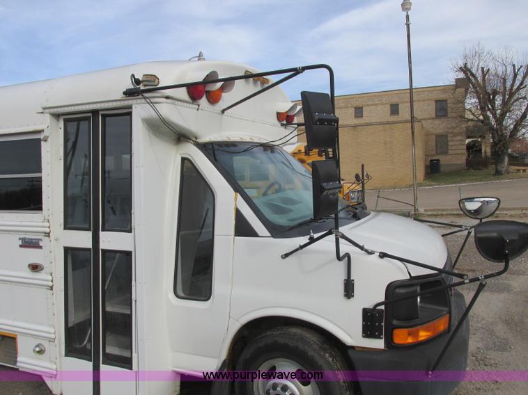 image for item J2354 2004 GMC Savana Thomas Built bus