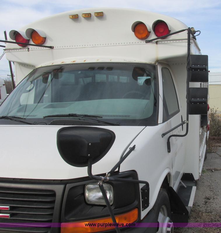 image for item J2354 2004 GMC Savana Thomas Built bus