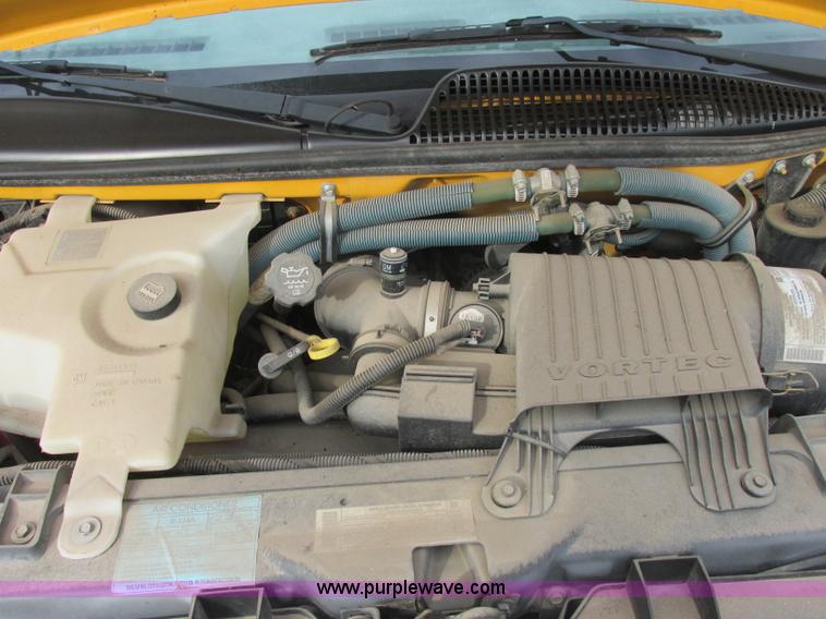 image for item J2354 2004 GMC Savana Thomas Built bus