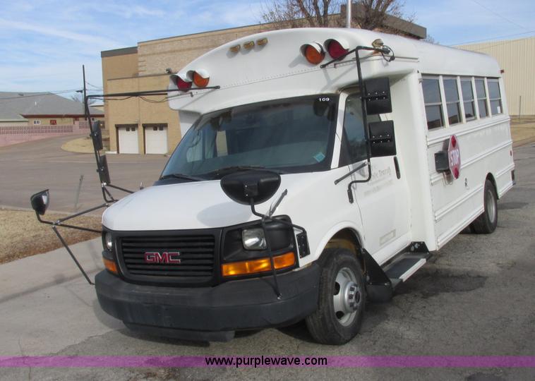 image for item J2357 2004 GMC Savana Thomas Built bus