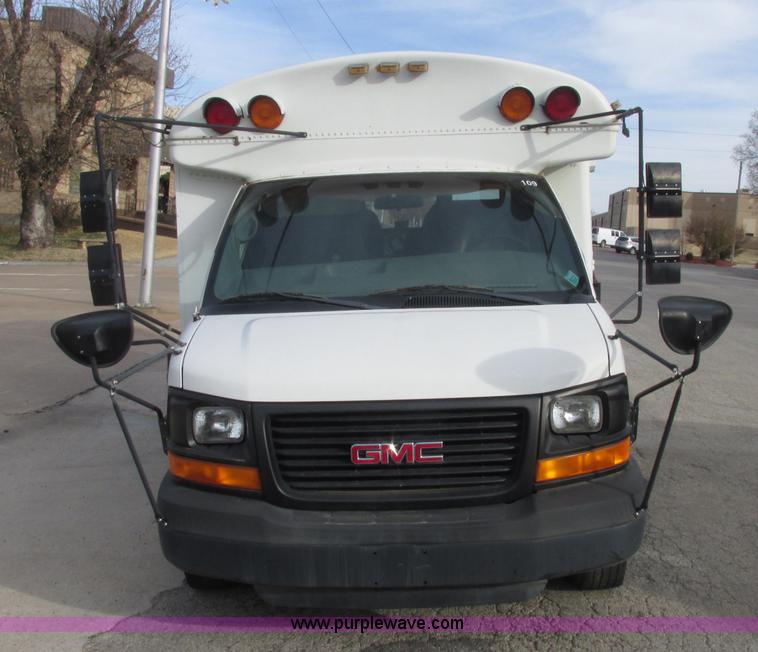 image for item J2357 2004 GMC Savana Thomas Built bus