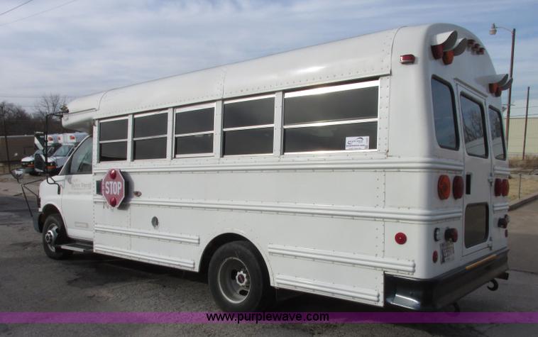 image for item J2357 2004 GMC Savana Thomas Built bus