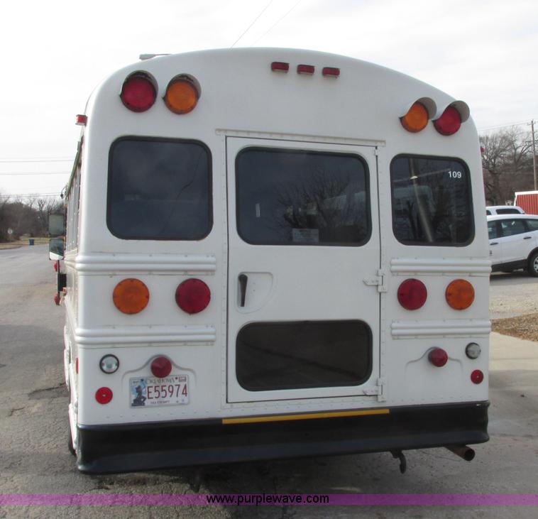 image for item J2357 2004 GMC Savana Thomas Built bus