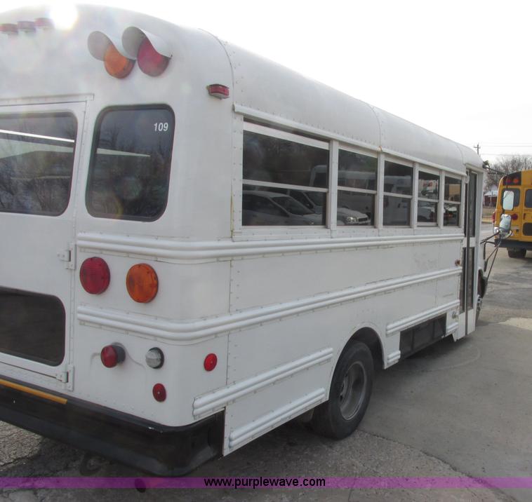 image for item J2357 2004 GMC Savana Thomas Built bus