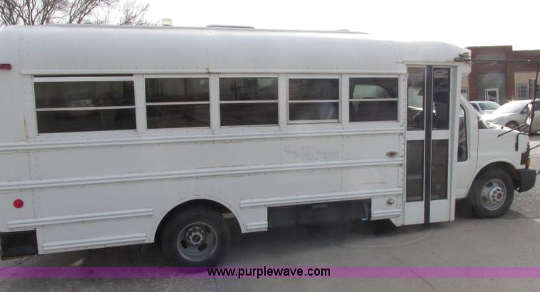 image for item J2357 2004 GMC Savana Thomas Built bus