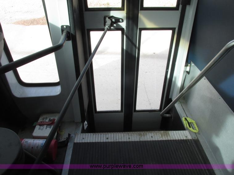 image for item J2357 2004 GMC Savana Thomas Built bus