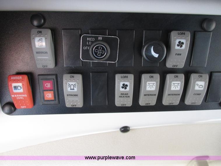 image for item J2357 2004 GMC Savana Thomas Built bus