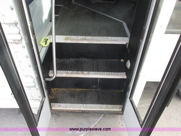 image for item J2357 2004 GMC Savana Thomas Built bus