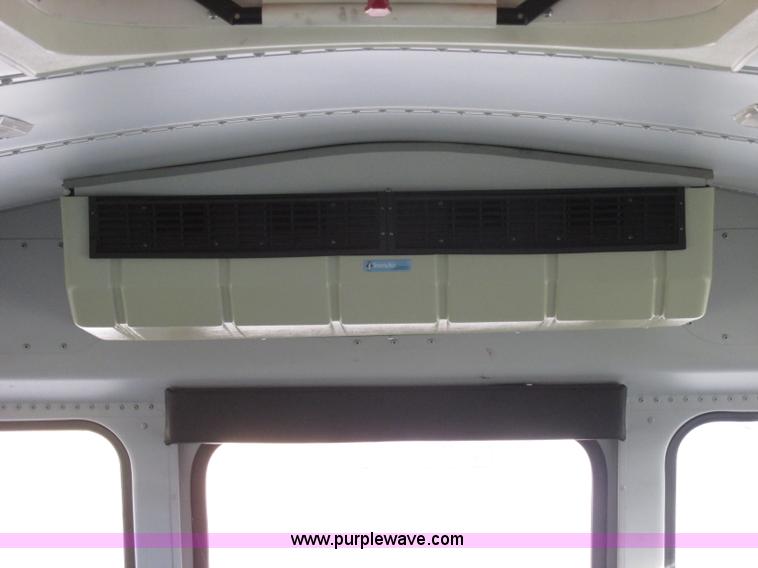 image for item J2357 2004 GMC Savana Thomas Built bus