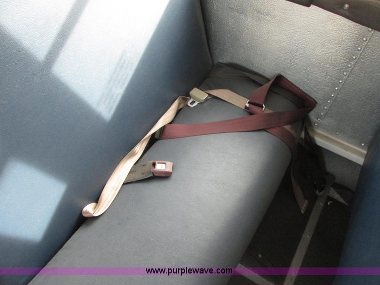 image for item J2357 2004 GMC Savana Thomas Built bus