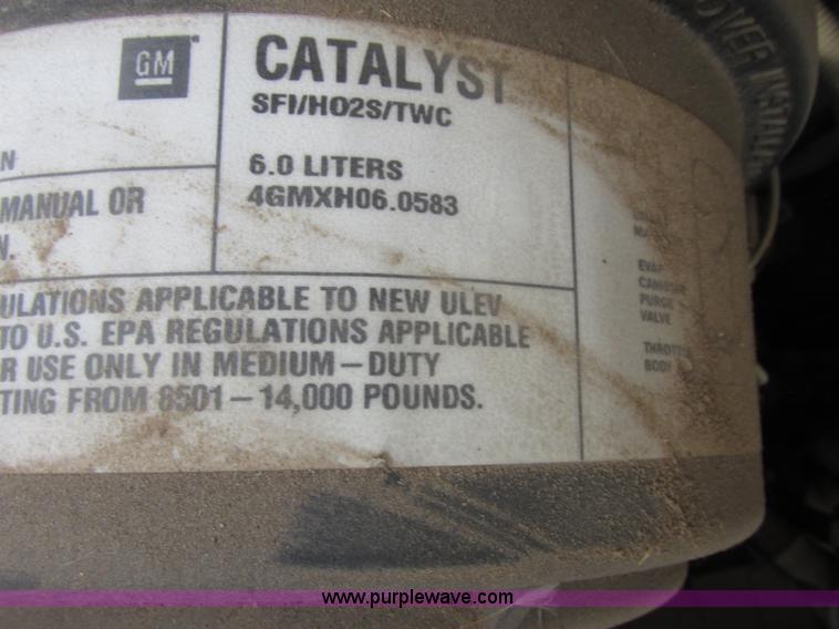 image for item J2357 2004 GMC Savana Thomas Built bus