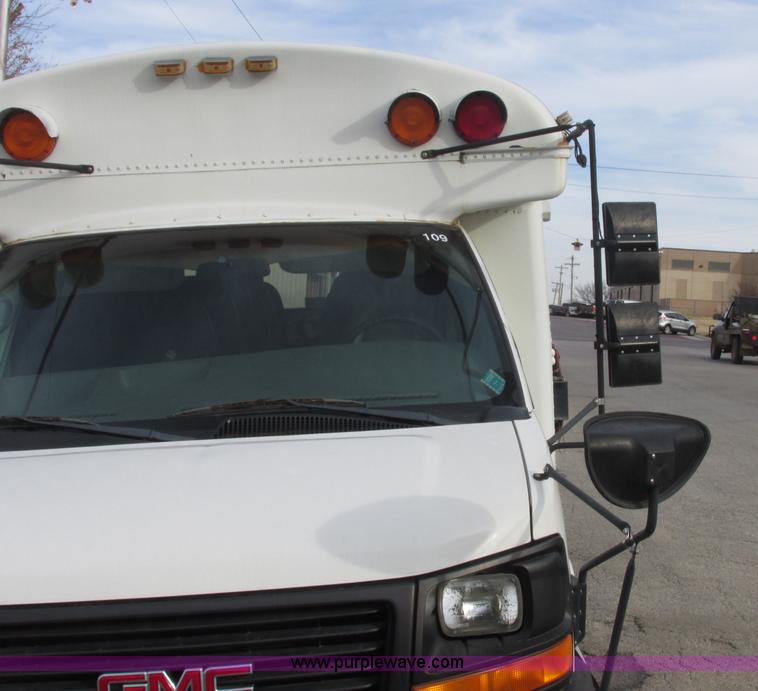 image for item J2357 2004 GMC Savana Thomas Built bus