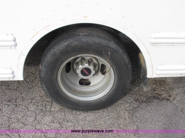 image for item J2357 2004 GMC Savana Thomas Built bus