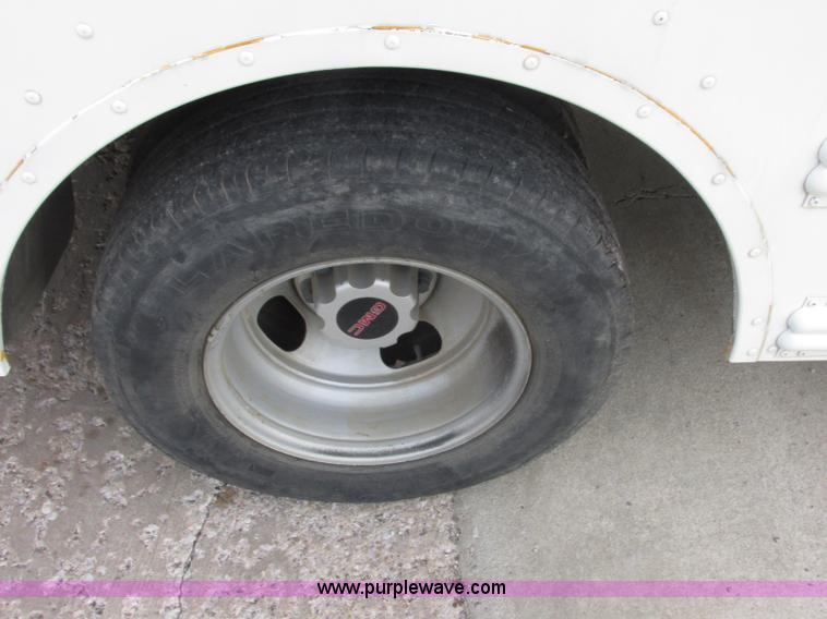 image for item J2357 2004 GMC Savana Thomas Built bus