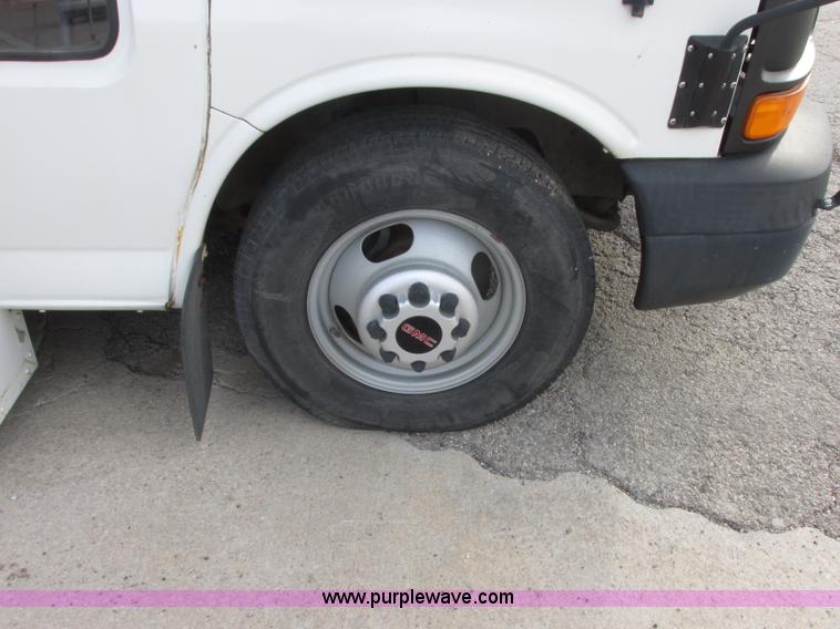 image for item J2357 2004 GMC Savana Thomas Built bus