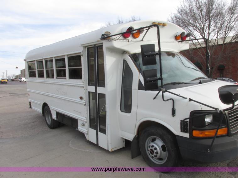 image for item J2357 2004 GMC Savana Thomas Built bus