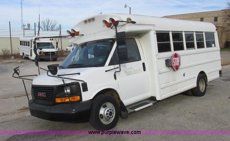 image for item J2358 2004 GMC Savana Thomas Built bus