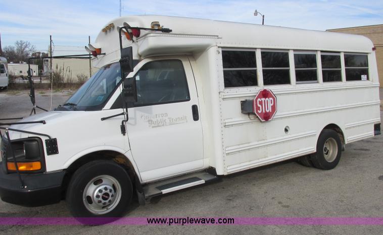 image for item J2358 2004 GMC Savana Thomas Built bus