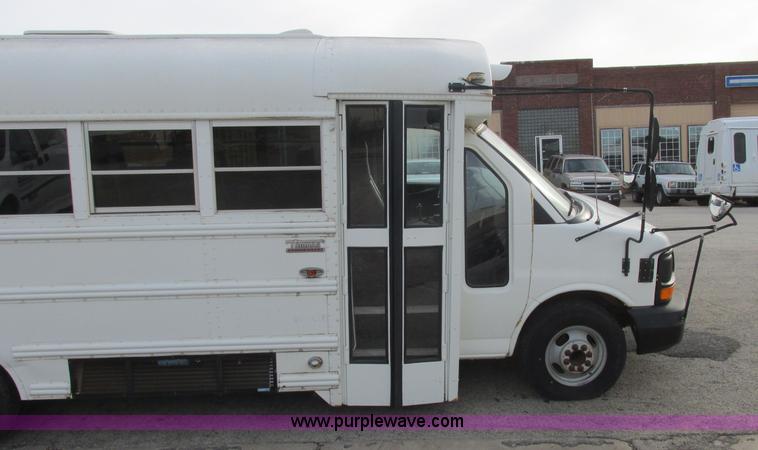 image for item J2358 2004 GMC Savana Thomas Built bus