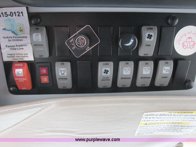 image for item J2358 2004 GMC Savana Thomas Built bus