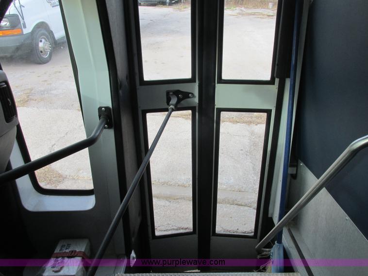 image for item J2358 2004 GMC Savana Thomas Built bus