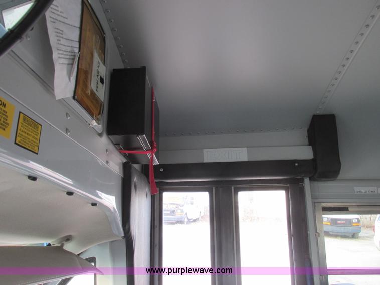 image for item J2358 2004 GMC Savana Thomas Built bus