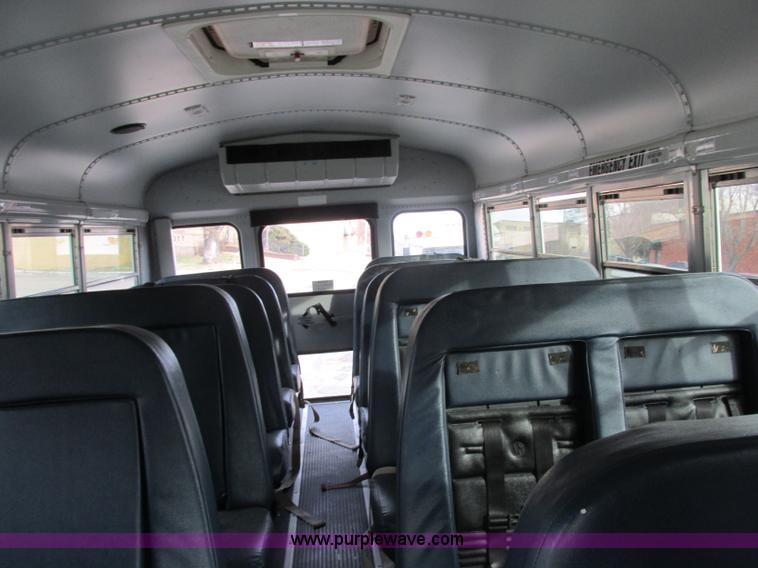 image for item J2358 2004 GMC Savana Thomas Built bus