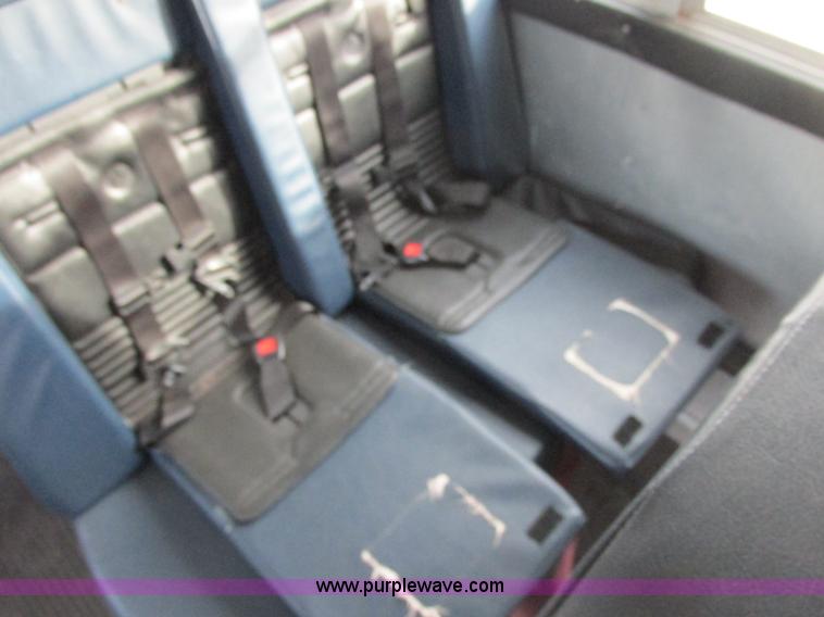 image for item J2358 2004 GMC Savana Thomas Built bus