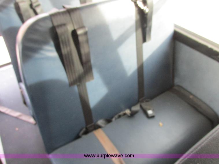 image for item J2358 2004 GMC Savana Thomas Built bus