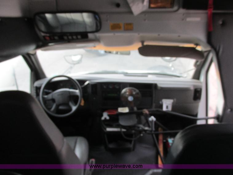 image for item J2358 2004 GMC Savana Thomas Built bus