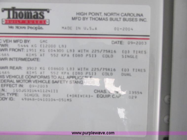 image for item J2358 2004 GMC Savana Thomas Built bus