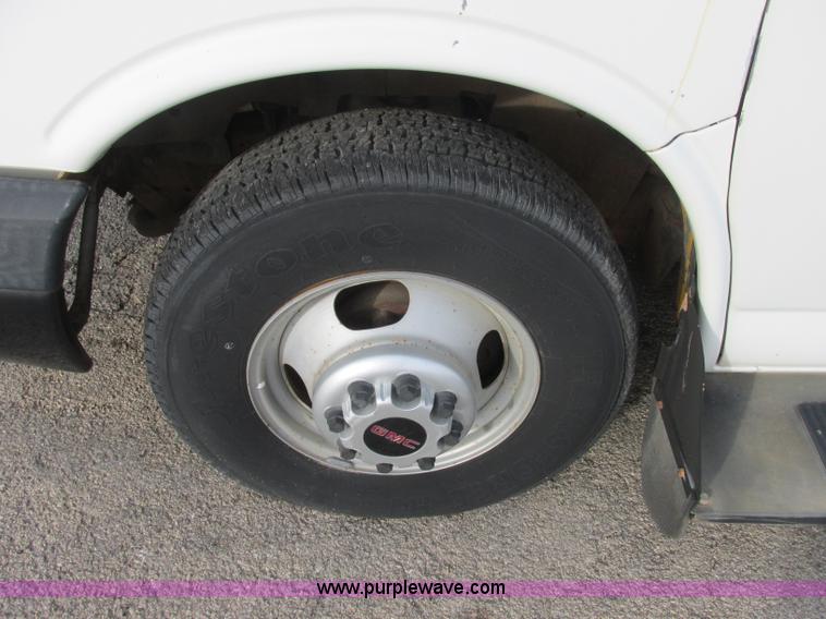 image for item J2358 2004 GMC Savana Thomas Built bus