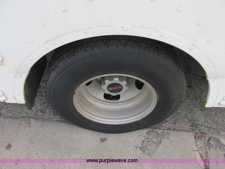 image for item J2358 2004 GMC Savana Thomas Built bus